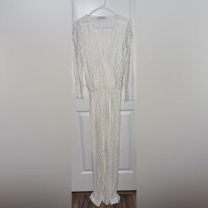 ALEXIE Jumpsuit
Size M
Off-white